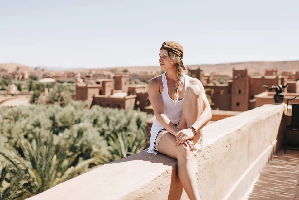 Traveller looking across the ochre landscape near Ouarzazate